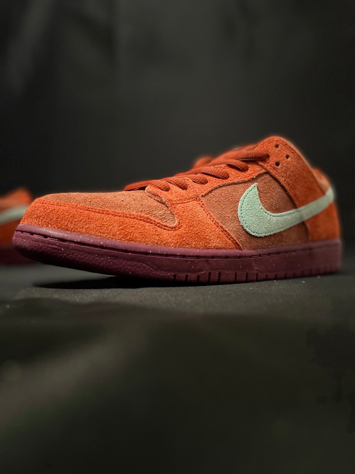 Nike SB Dunk Low Mystic Red Rosewood sneakers - Iconic retro style with plush suede in Mystic Red. DV0833-600 Men's Sneakers. Elevate your streetwear game. #NikeSBDunk #MysticRedRosewood